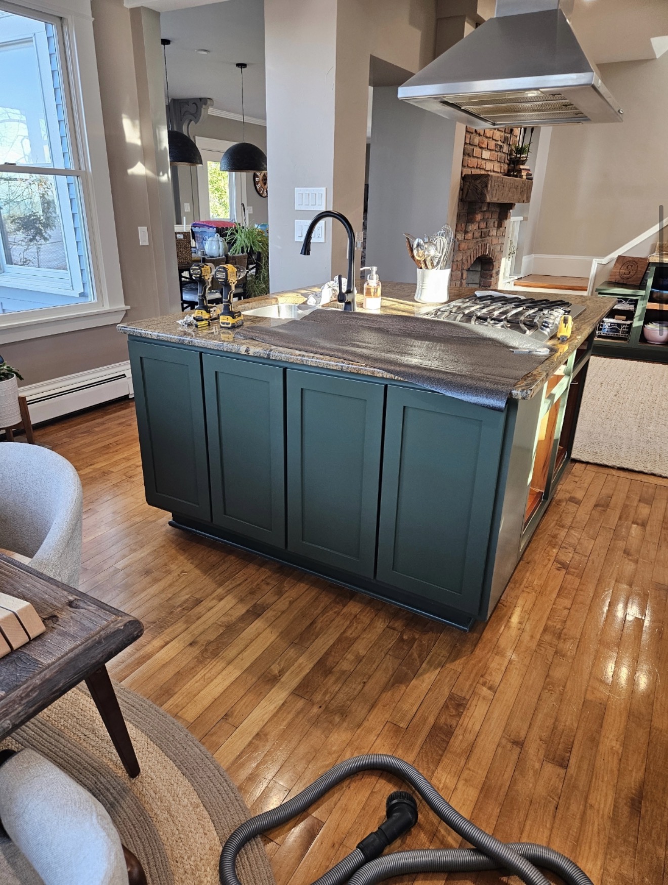 Kitchen island after cabinet painting